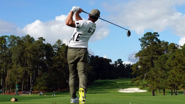 Paul Casey plays his shot from the eighth tee during the first round of The Masters golf tournament at Augusta National GC.